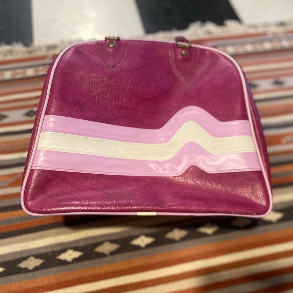 Bowling ball bag! Purse! Diaper bag! Whatever!